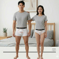 Couple wearing matching cotton underwear with cartoon print