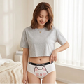 Woman wearing matching cartoon print cotton brief